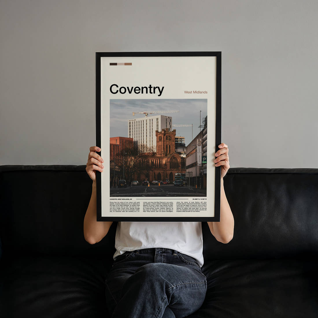 Coventry Cathedral And Skyline Travel Print held up by hand to show the size of the print