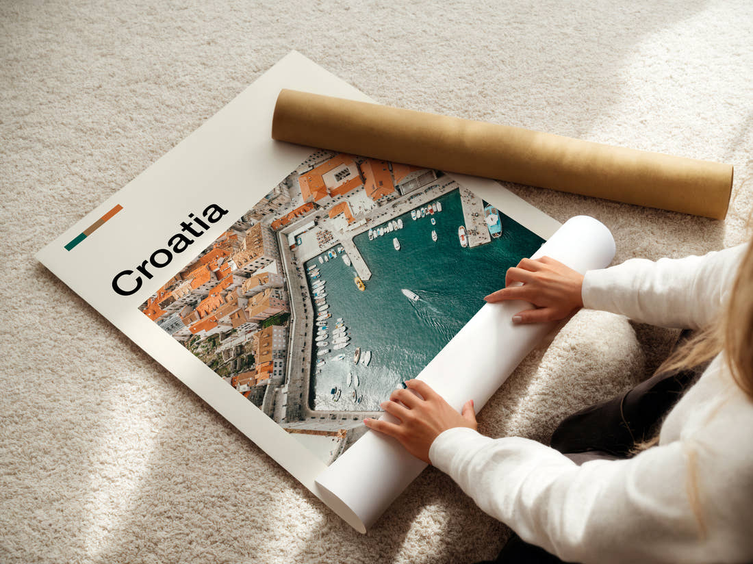 Croatia Harbour And Rooftops Travel Print being unrolled from its postal tube