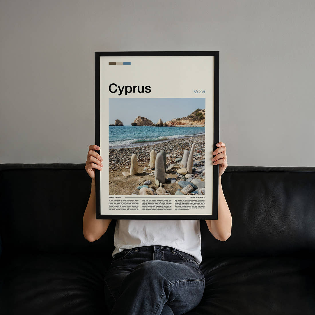 Cyprus Stone Stacks, Pebbled Shore Travel Print held up by hand to show the size of the print