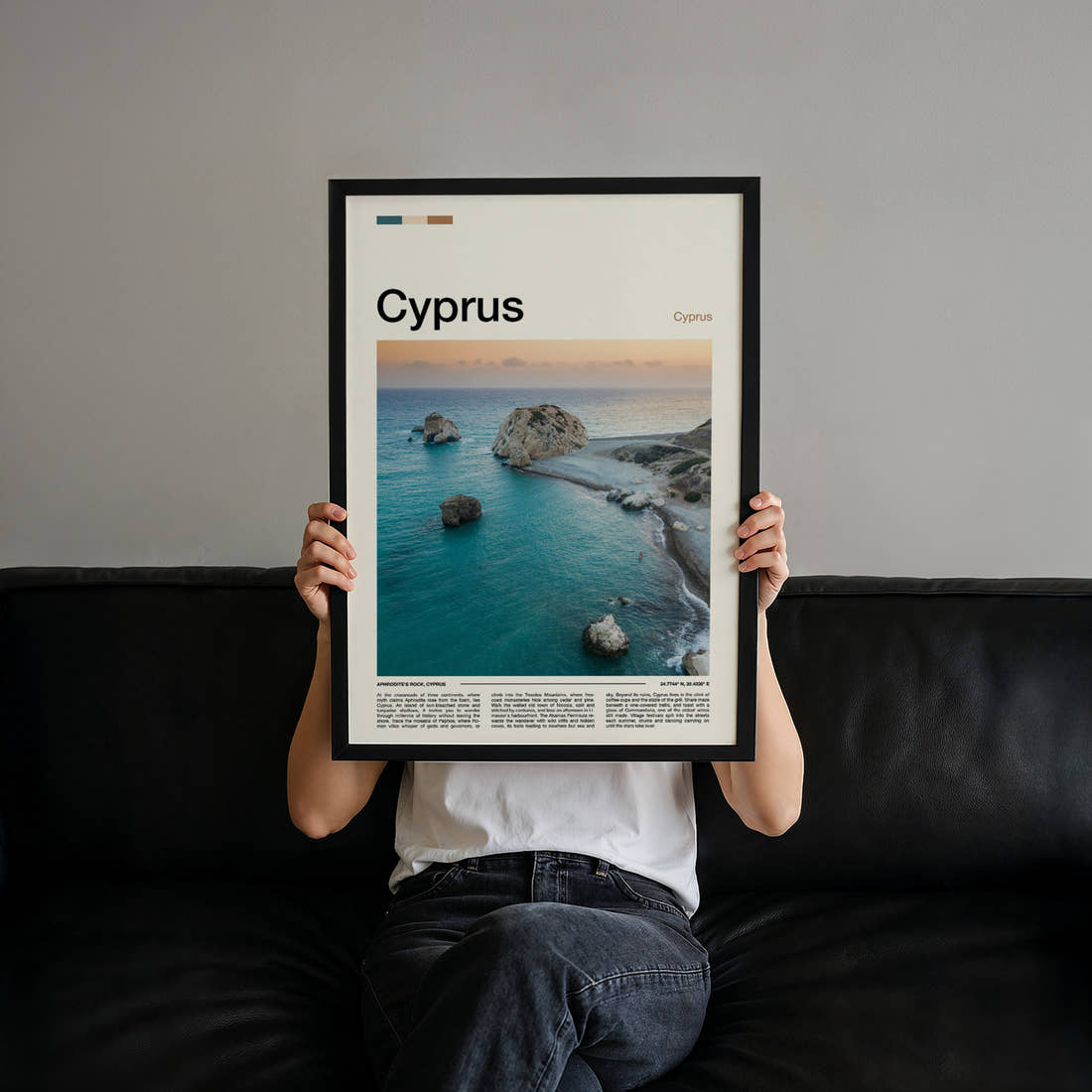 Cyprus Aerial Sea Stacks Travel Print held up by hand to show the size of the print