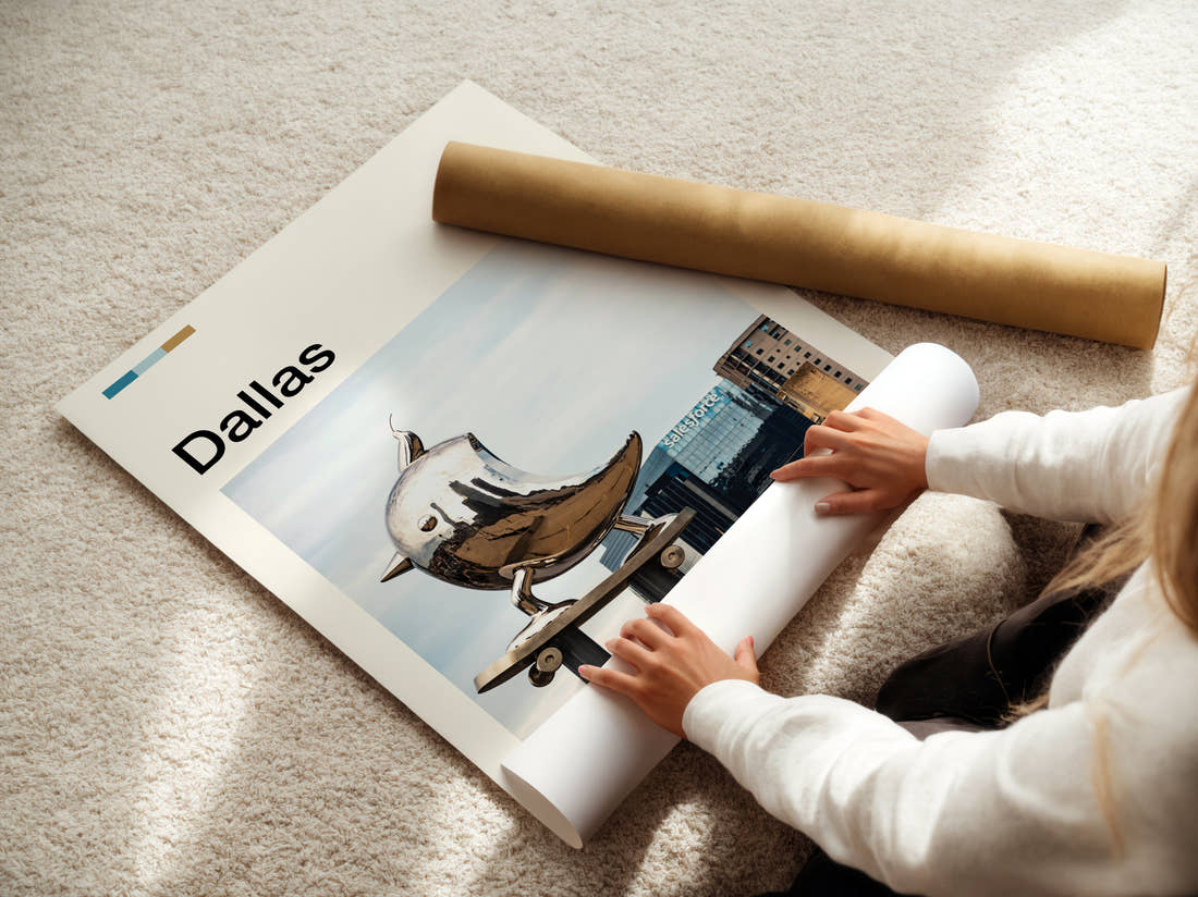 Dallas Silver Bird Sculpture Travel Print being unrolled from its postal tube