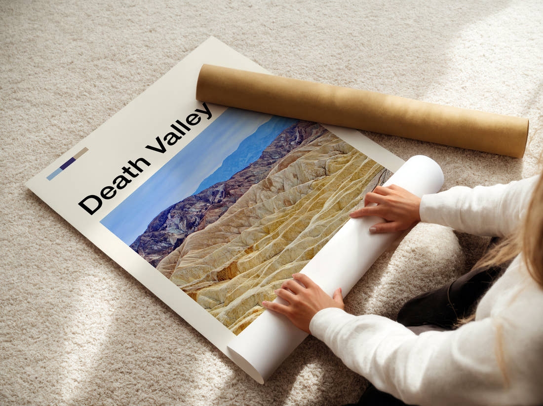 Death Valley Zabriskie Point Travel Print being unrolled from its postal tube
