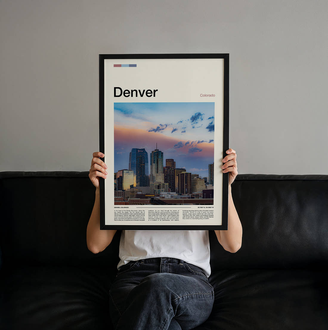 Denver Skyline At Dusk Travel Print held up by hand to show the size of the print