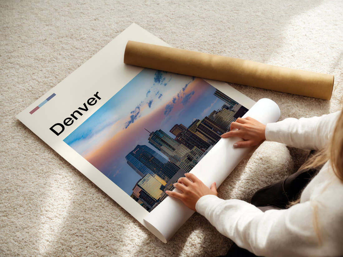 Denver Skyline At Dusk Travel Print being unrolled from its postal tube