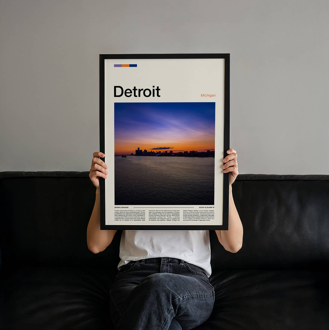 Detroit Sunset Over The Water Travel Print held up by hand to show the size of the print