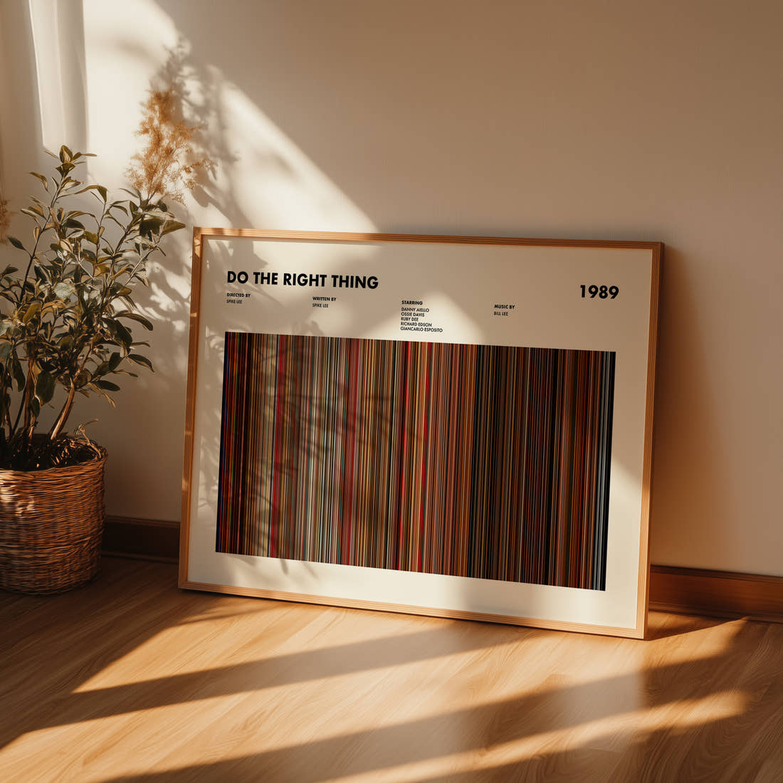 Do The Right Thing Movie Barcode Poster framed and leaning against a wall on a wooden floor