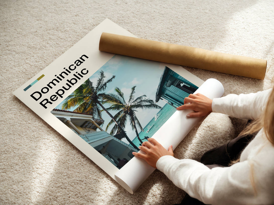 Dominican Republic Beach Huts And Palms Travel Print being unrolled from its postal tube