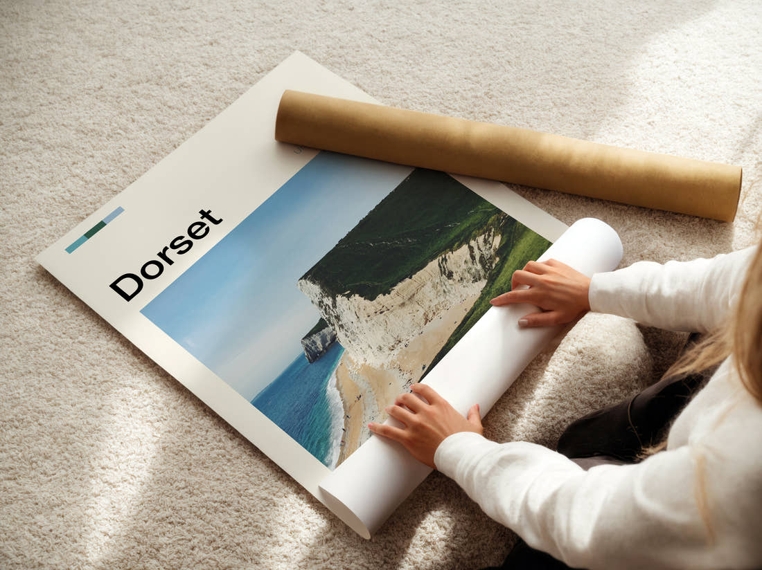 Dorset White Chalk Cliffs Travel Print being unrolled from its postal tube