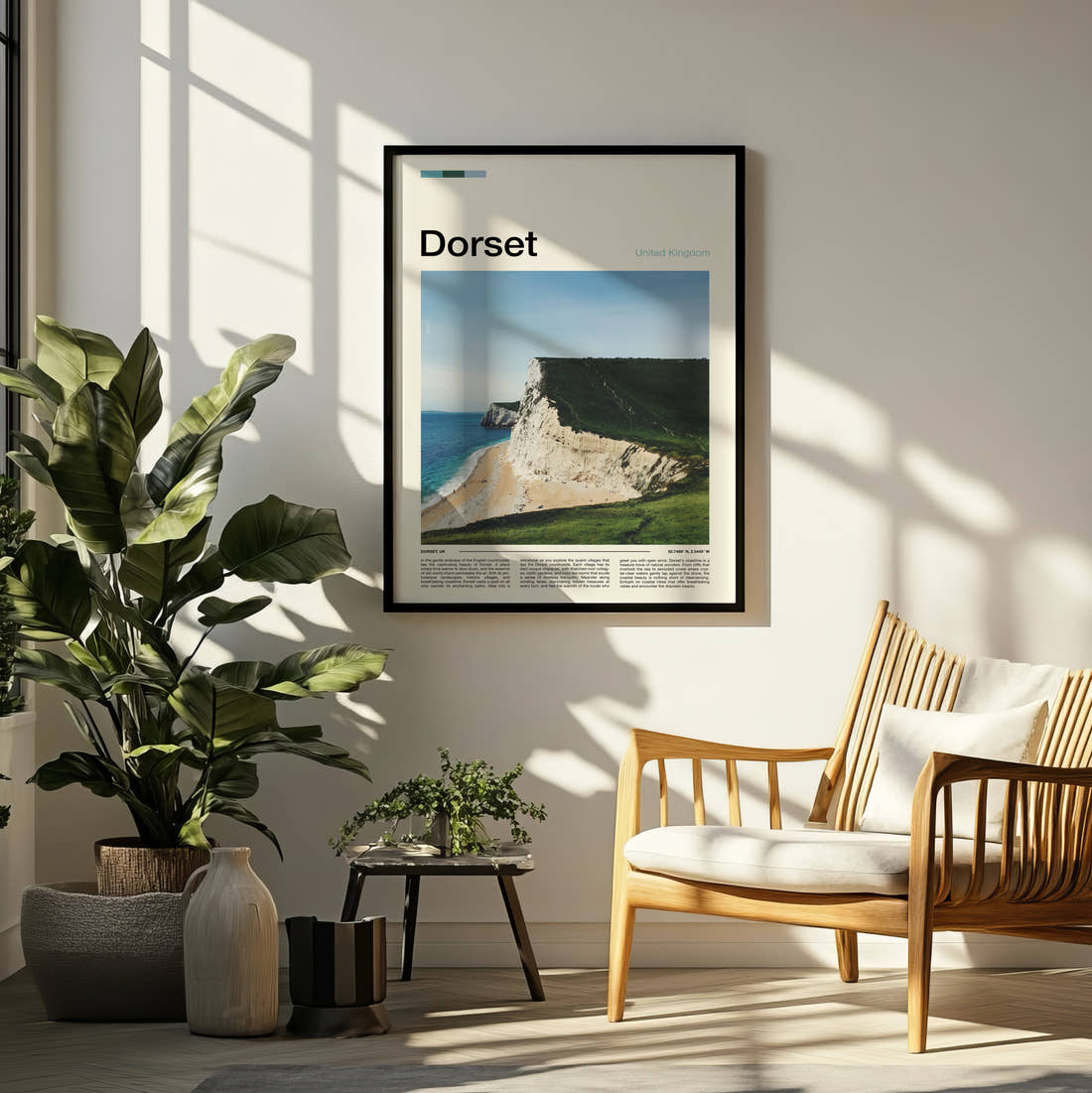 Dorset White Chalk Cliffs Travel Print framed on a pale wall beside houseplants