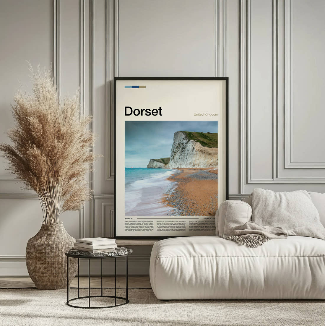 Dorset Chalk Cliffs And Beach Travel Print framed on the wall of a calm, neutral bedroom