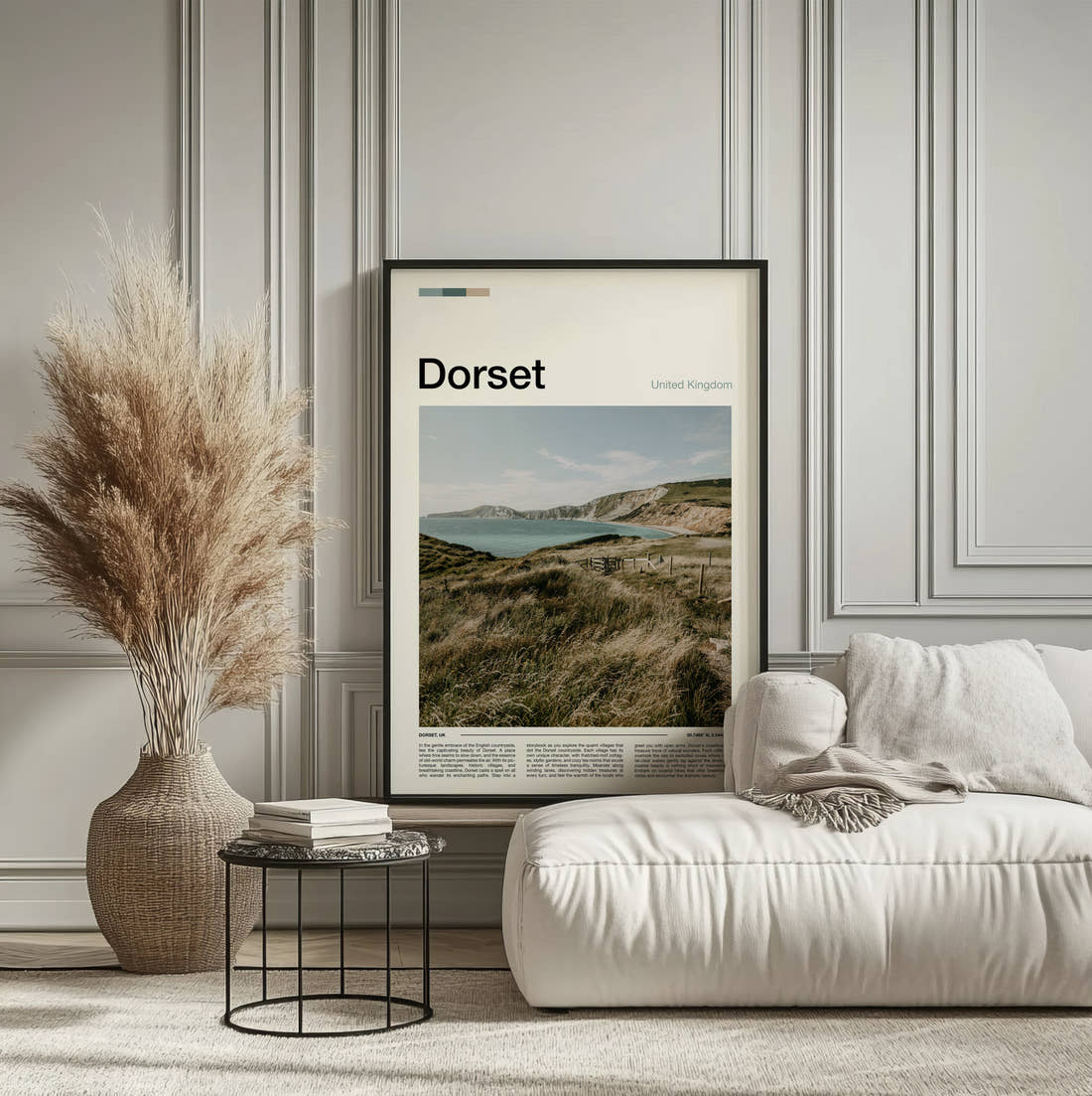 Dorset Clifftop Over The Bay Travel Print framed on the wall of a calm, neutral bedroom