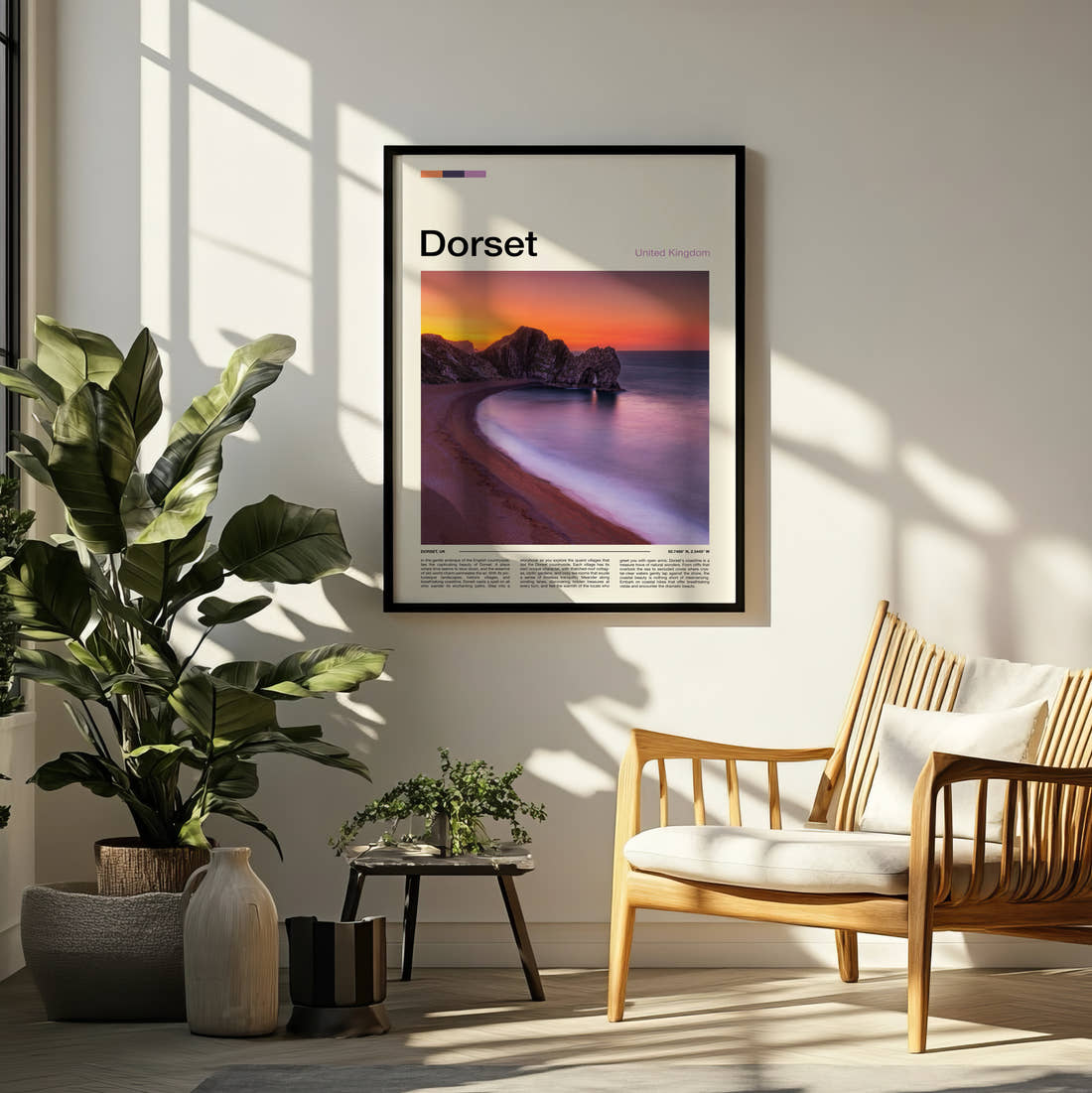 Dorset Durdle Door At Sunset Travel Print framed on a pale wall beside houseplants