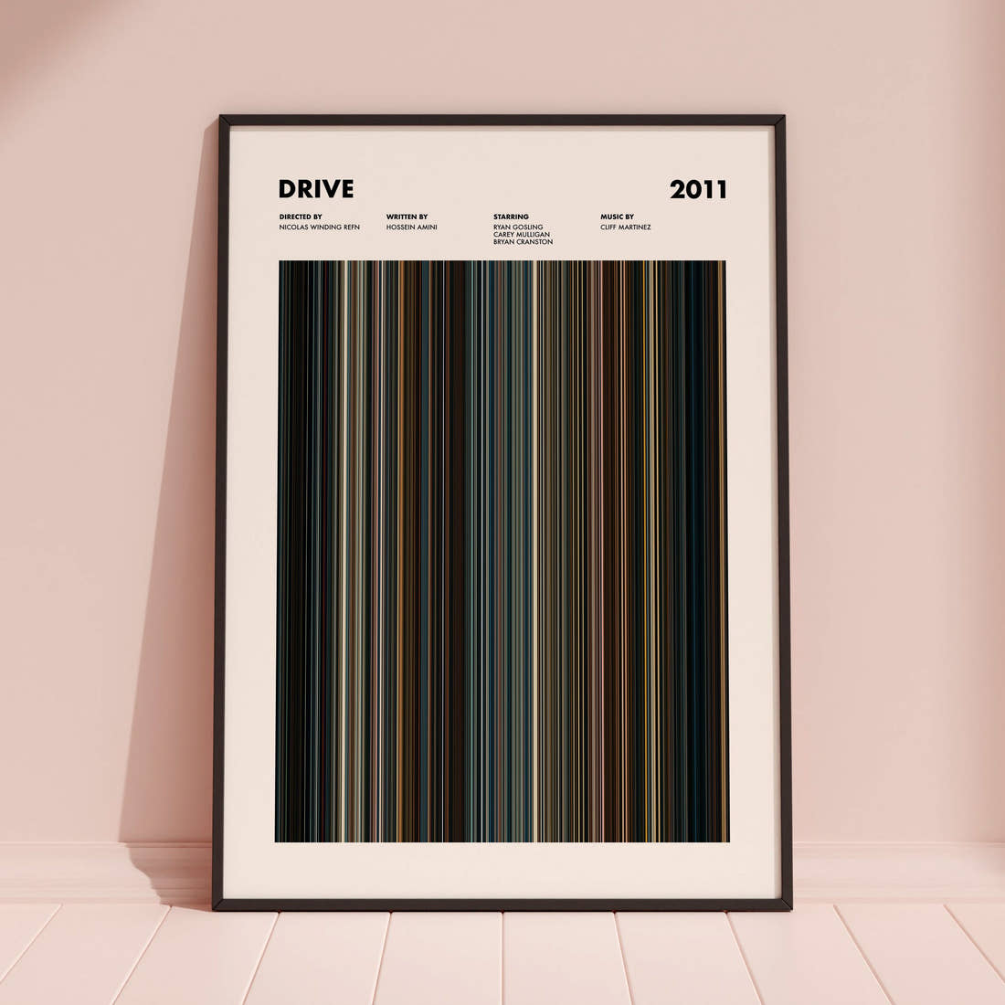 Drive Movie Barcode Poster framed and leaning against a coloured wall