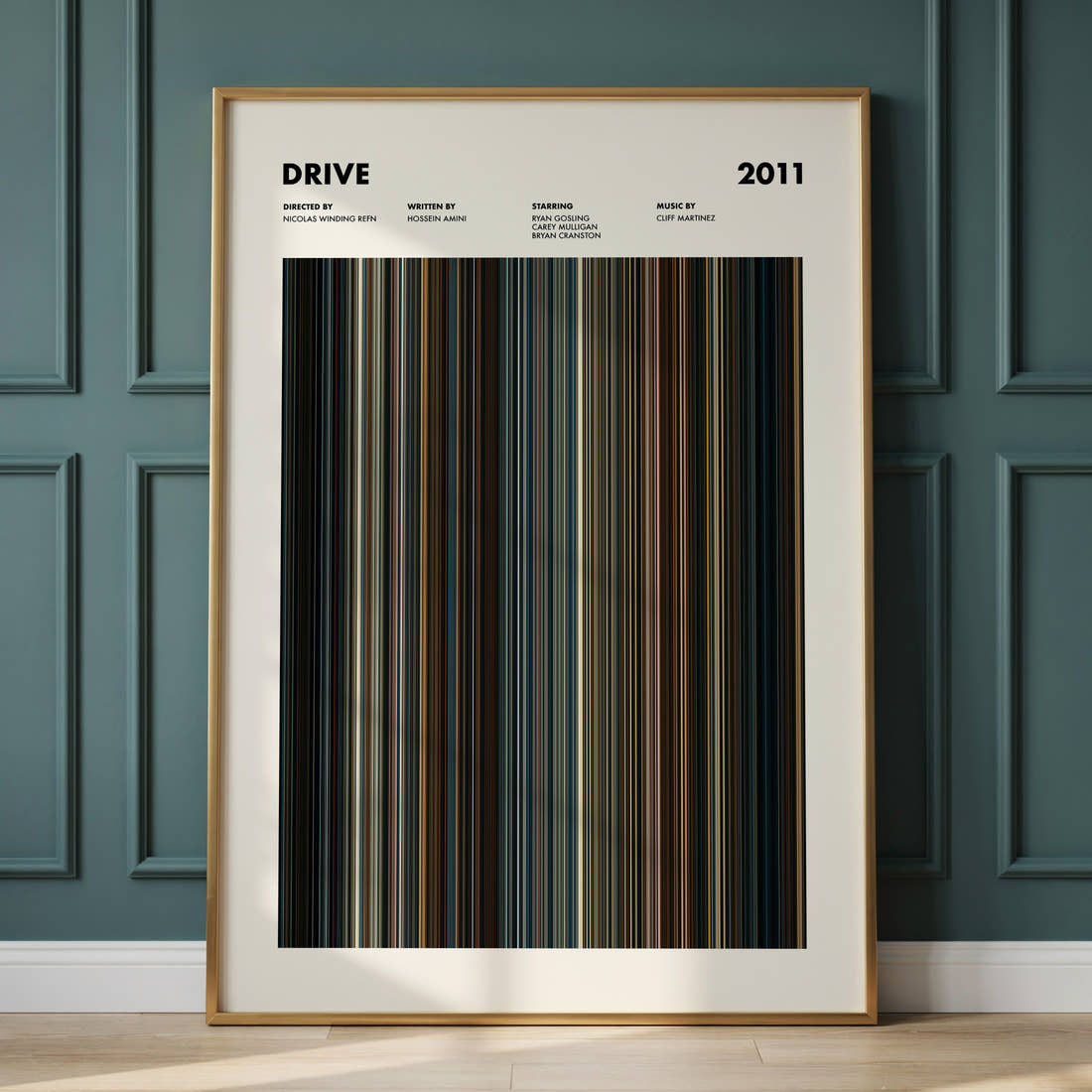 Drive Movie Barcode Poster framed and leaning against a panelled wall