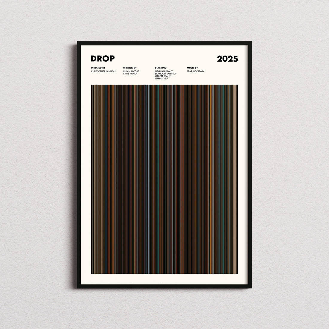Drop Movie Barcode Poster framed on a plain studio wall