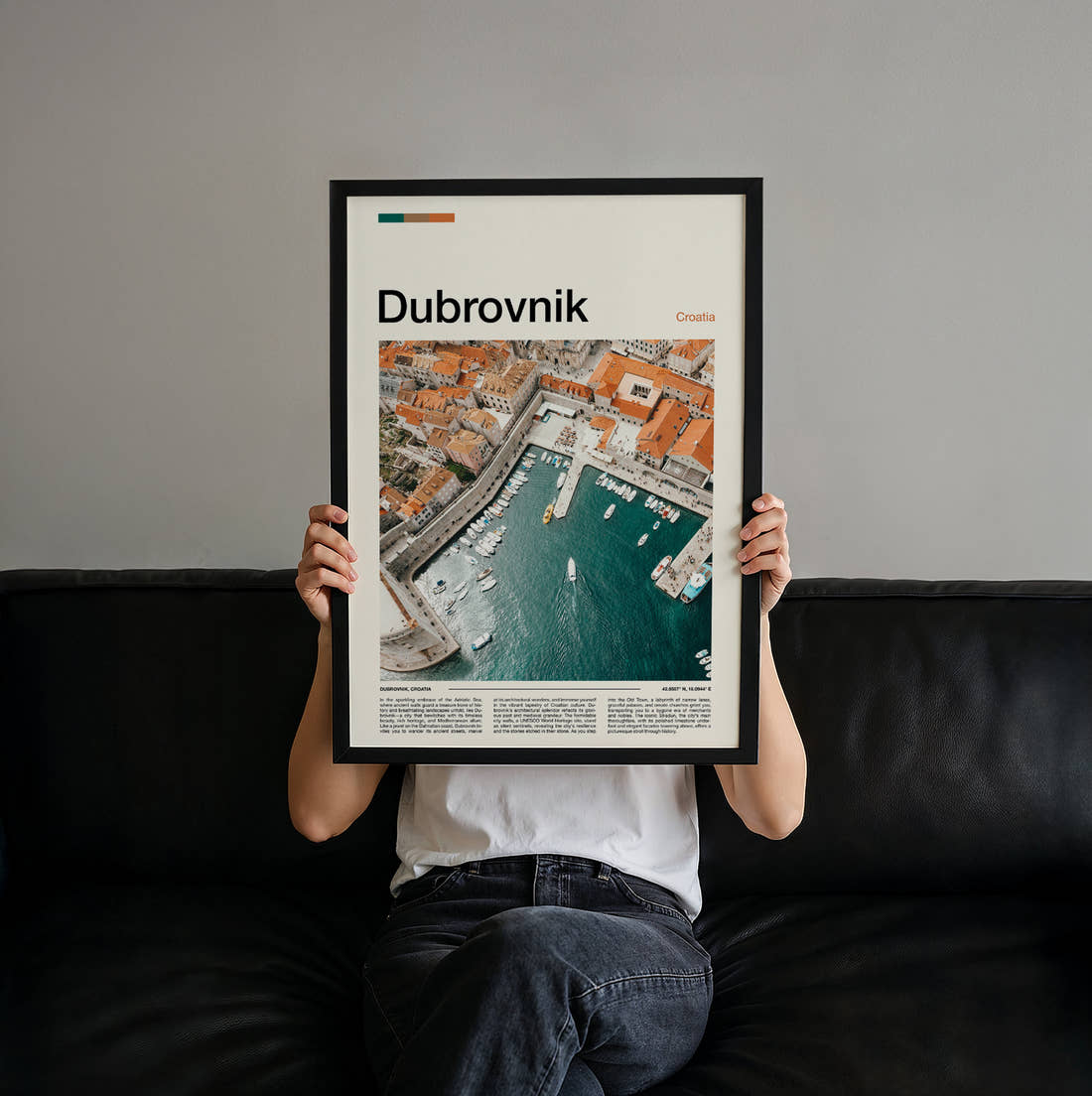 Dubrovnik Harbour From Above Travel Print held up by hand to show the size of the print