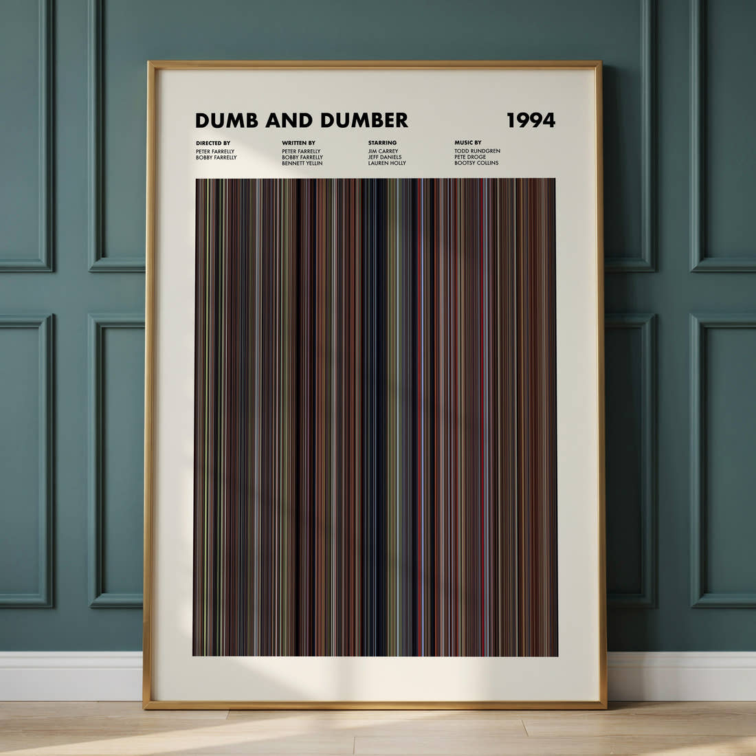 Dumb and Dumber Movie Barcode Poster framed and leaning against a panelled wall