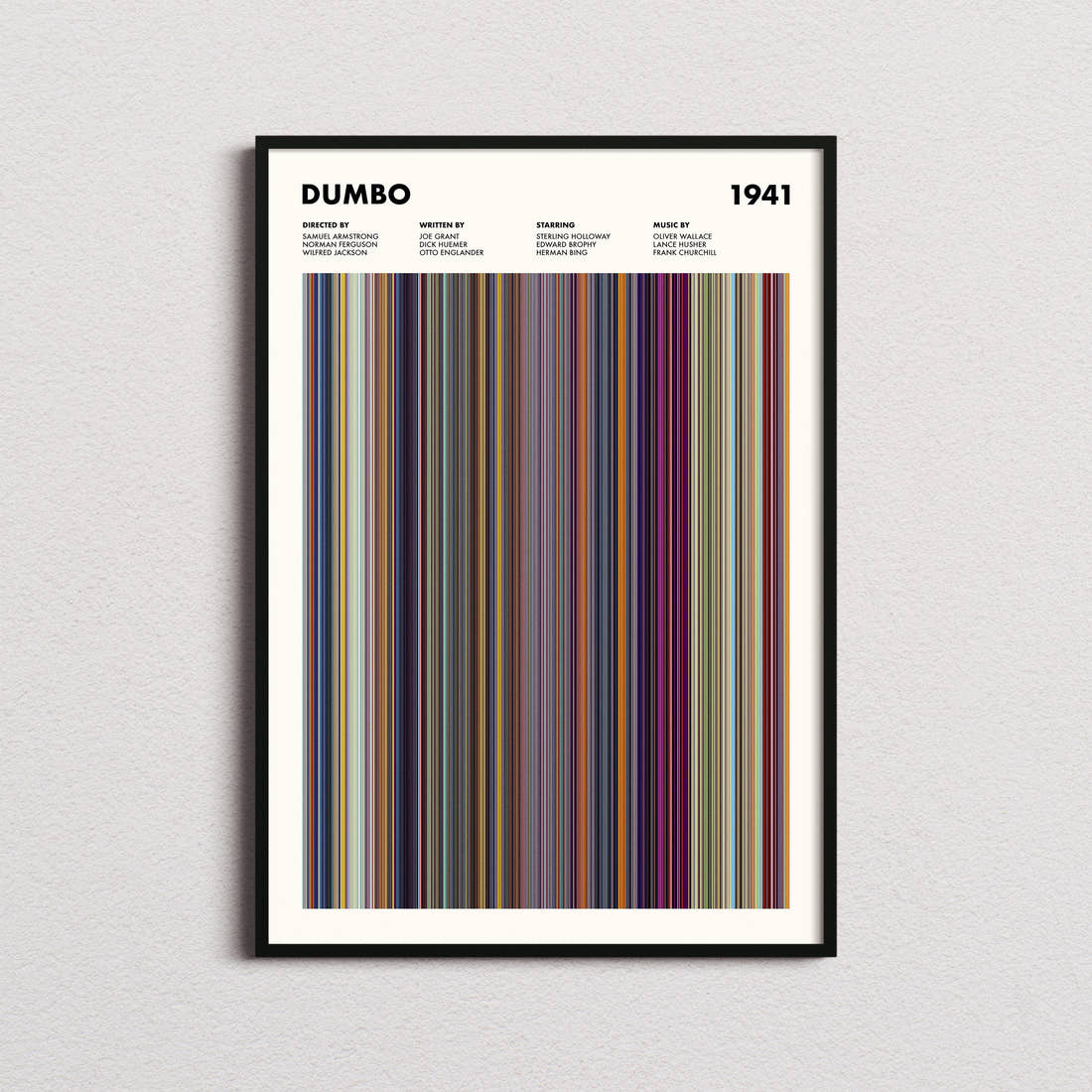 Dumbo Movie Barcode Poster framed on a plain studio wall