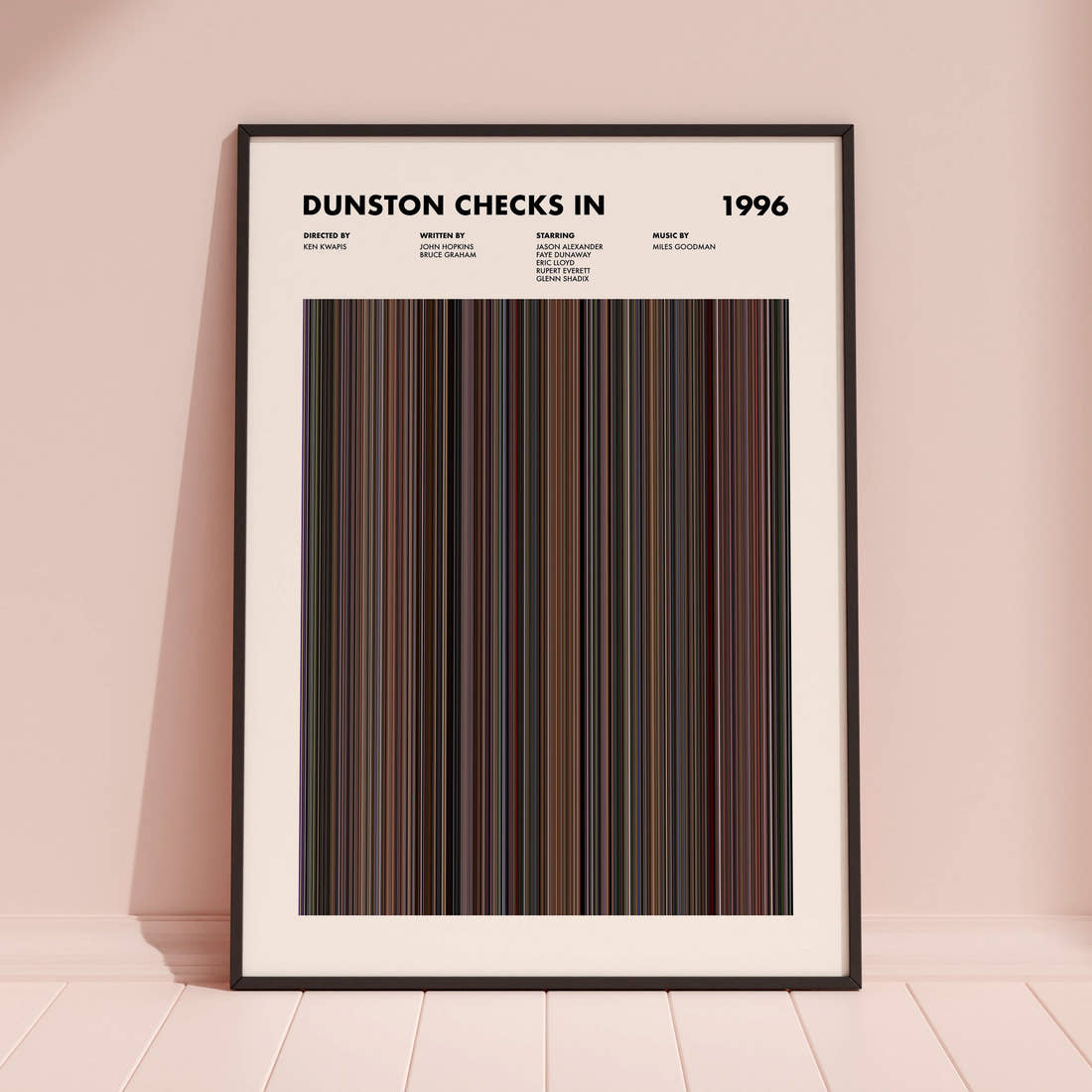 Dunston Checks In Movie Barcode Poster framed and leaning against a coloured wall