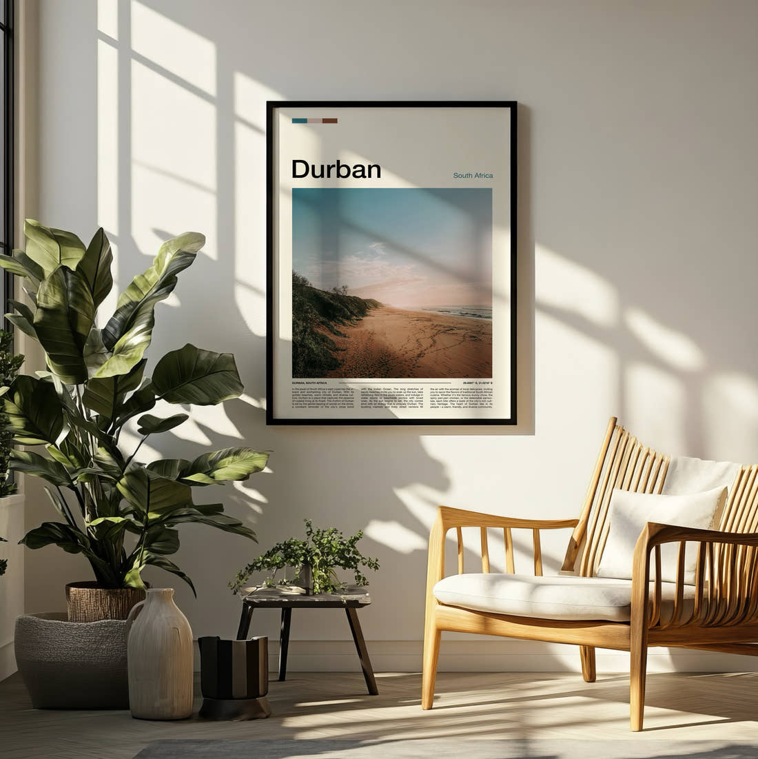 Durban Empty Beach Travel Print framed on a pale wall beside houseplants
