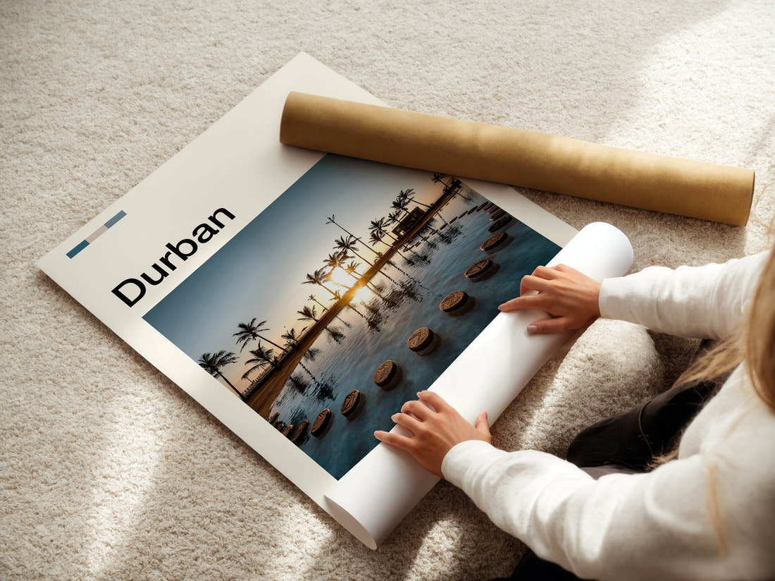 Durban Sunset Over The Water Travel Print being unrolled from its postal tube