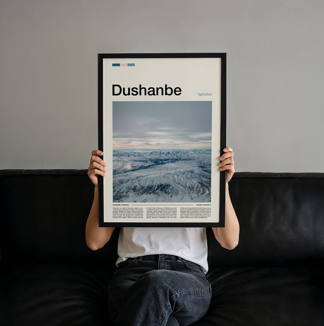 Dushanbe Snowy Mountains Travel Print held up by hand to show the size of the print