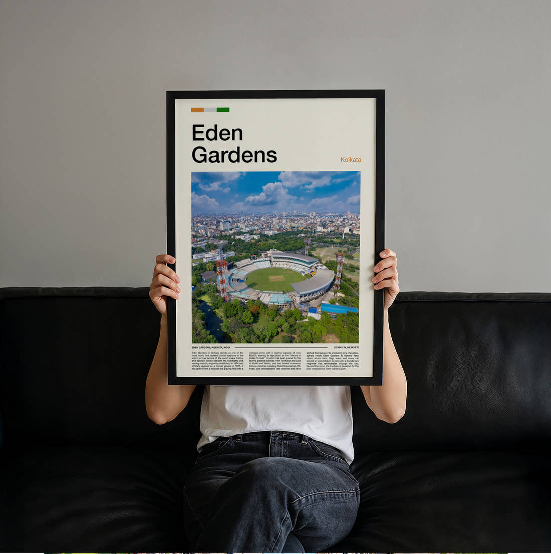 Eden Gardens Stadium Print held up by hand to show the size of the print