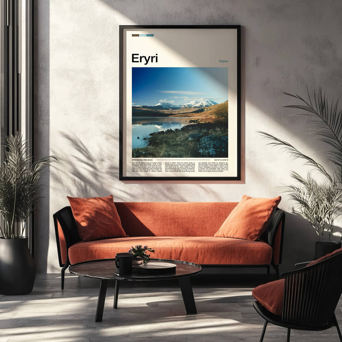 Eryri Snow-Capped Mountain Range Travel Print framed on the wall of a modern living room