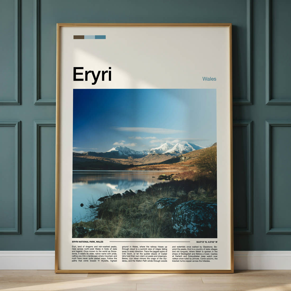 Eryri Snow-Capped Mountain Range Travel Print framed on the wall of a calm, neutral bedroom