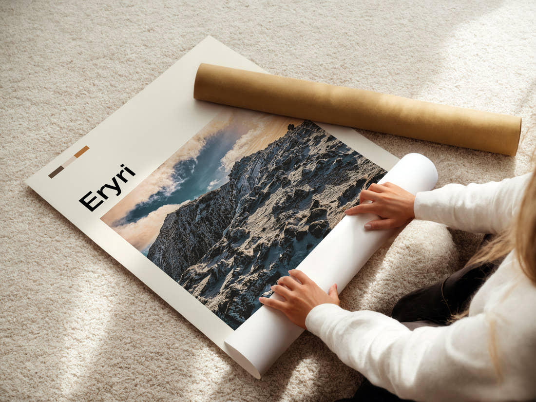 Eryri Snow-Capped Ridge Travel Print being unrolled from its postal tube