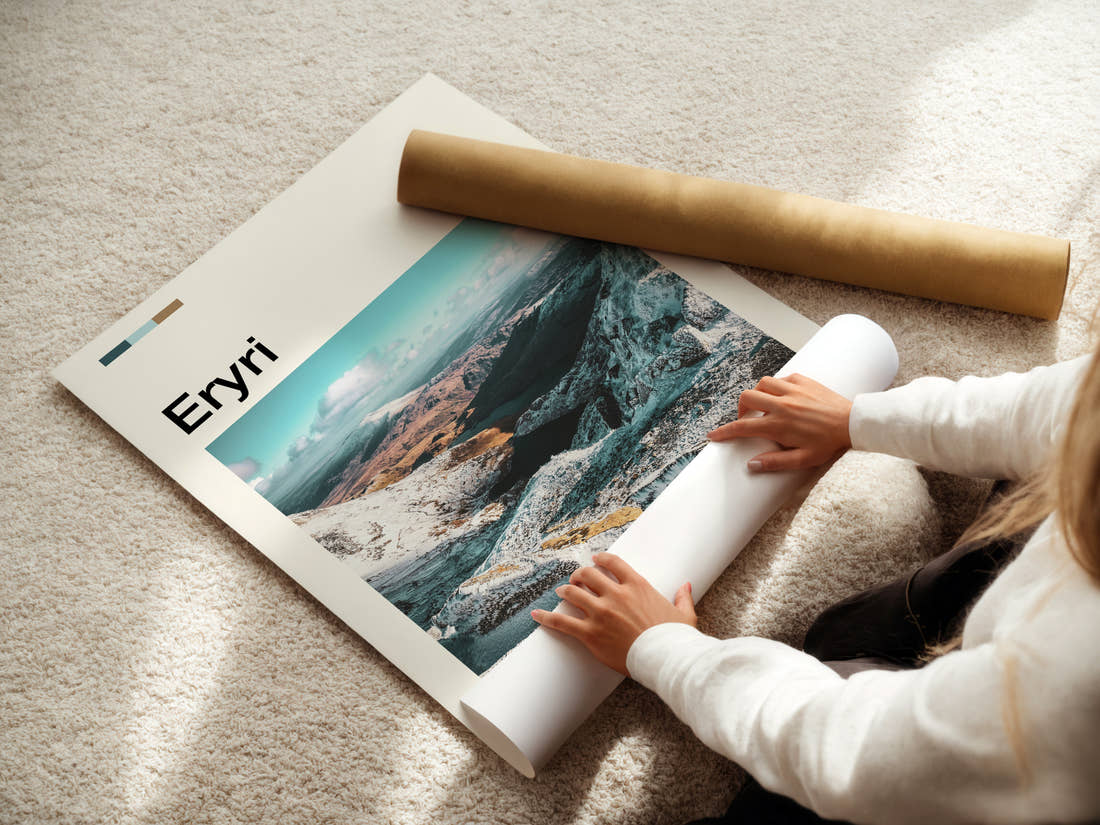 Eryri Snow-Dusted Mountain Valley Travel Print being unrolled from its postal tube