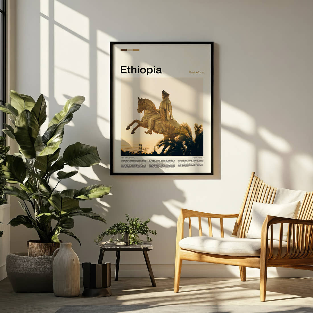 Ethiopia Golden Equestrian Statue Travel Print framed on a pale wall beside houseplants