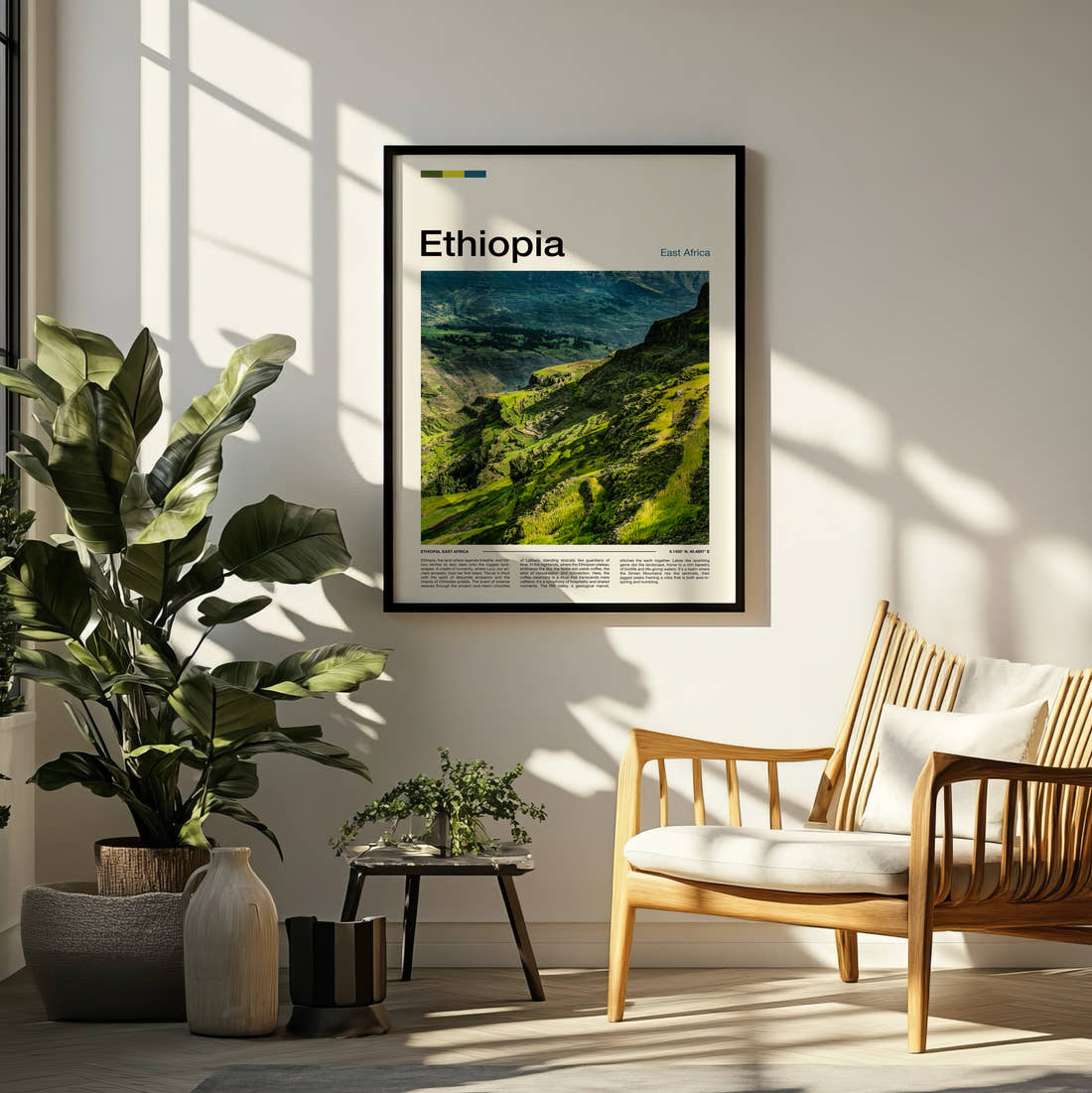 Ethiopia Green Mountain Valley Travel Print framed on a pale wall beside houseplants