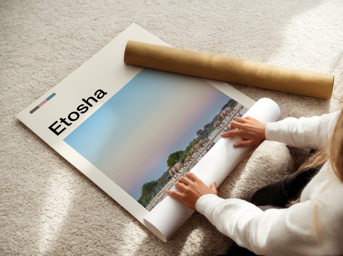 Etosha Elephants At The Waterhole Travel Print being unrolled from its postal tube