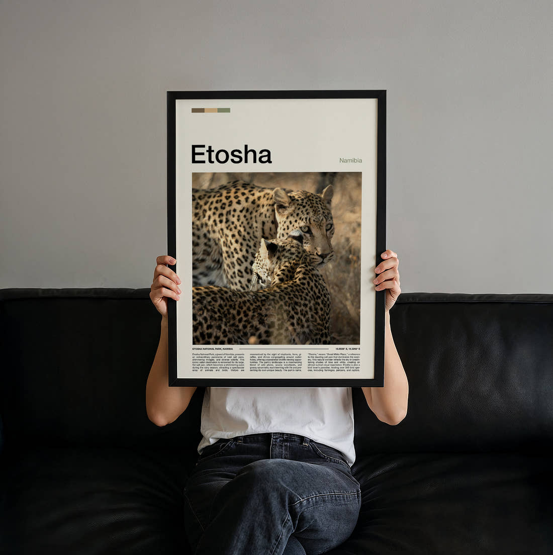 Etosha Two Leopards Travel Print held up by hand to show the size of the print