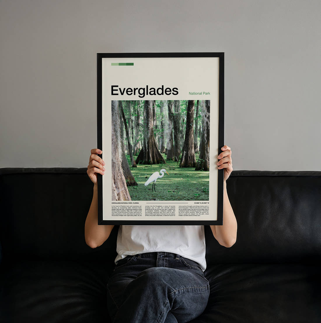 Everglades White Egret Travel Print held up by hand to show the size of the print