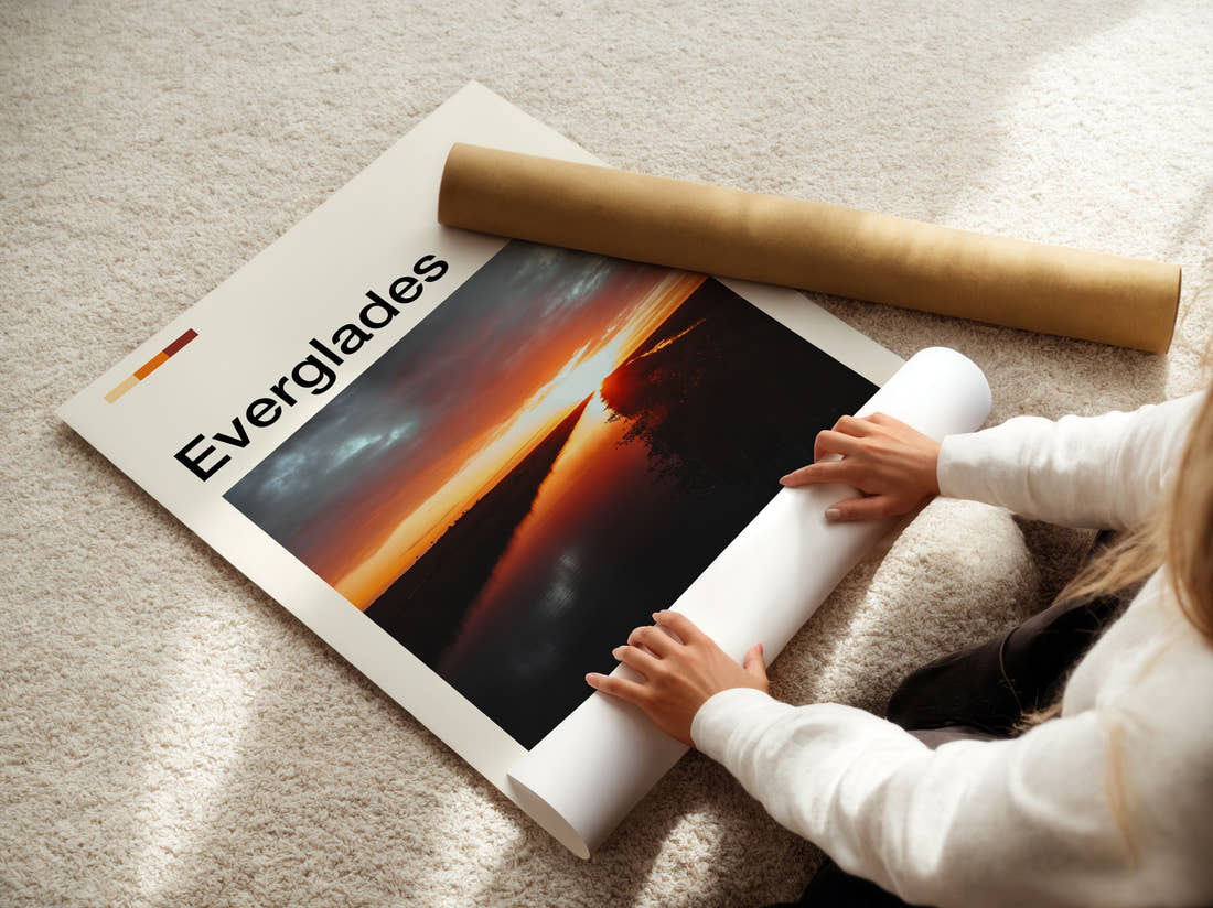 Everglades Sunset Over Water Travel Print being unrolled from its postal tube