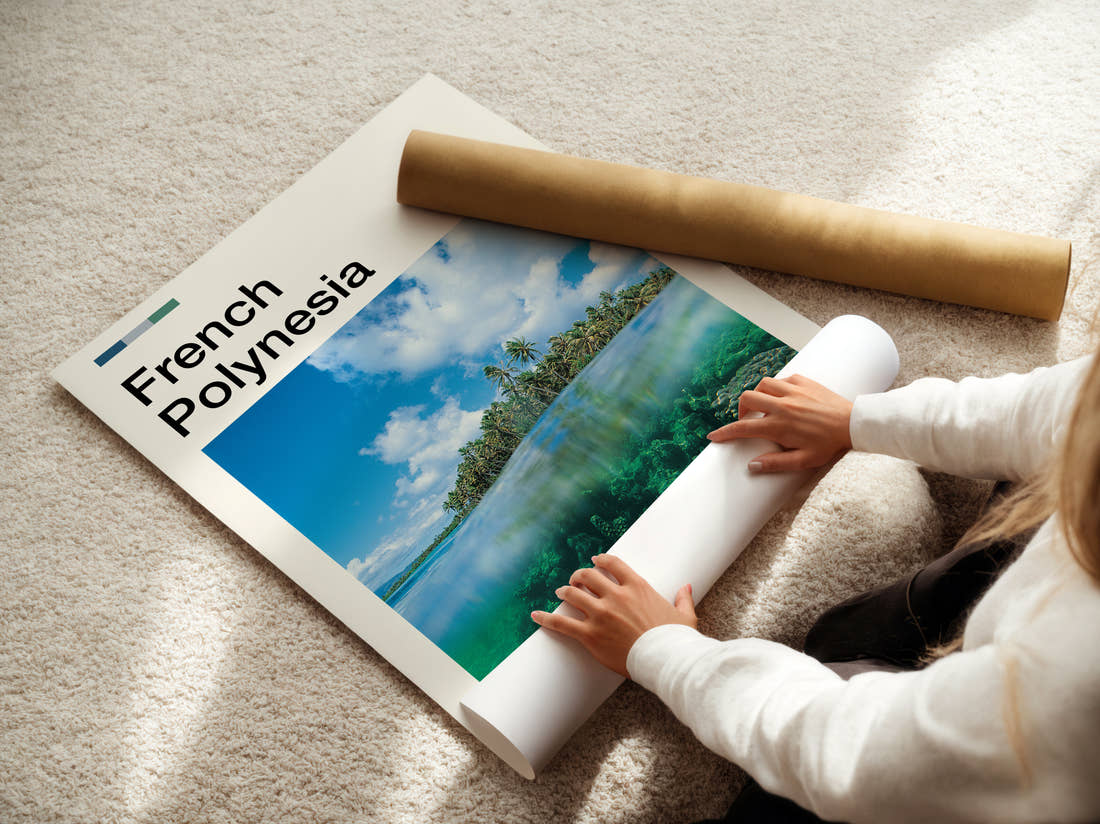 French Polynesia Over Under Reef View Travel Print being unrolled from its postal tube