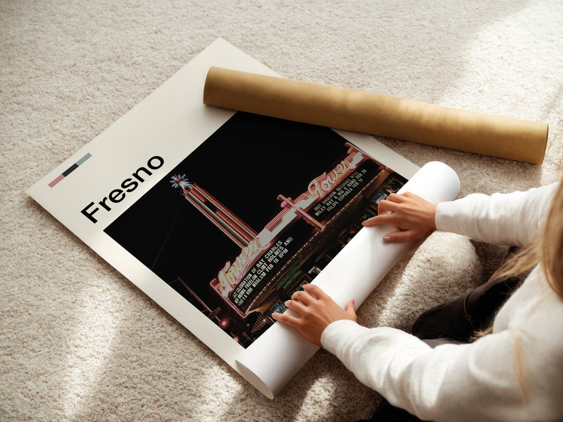 Fresno Tower Theatre Travel Print being unrolled from its postal tube