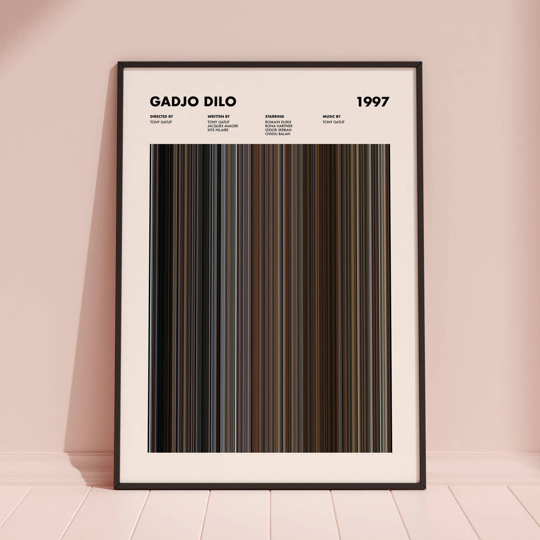 Gadjo Dilo Movie Barcode Poster framed and leaning against a coloured wall