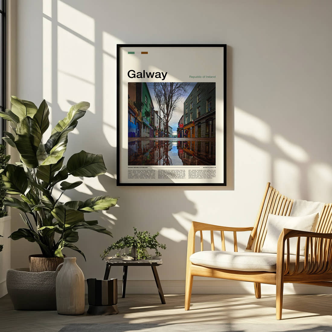 Galway Reflections In A Puddle Travel Print framed on a pale wall beside houseplants