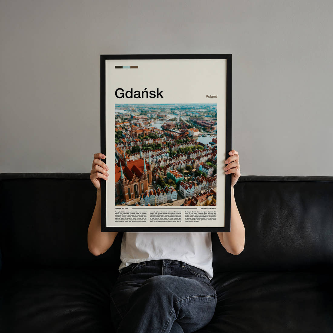 Gdańsk Old Town From Above Travel Print held up by hand to show the size of the print