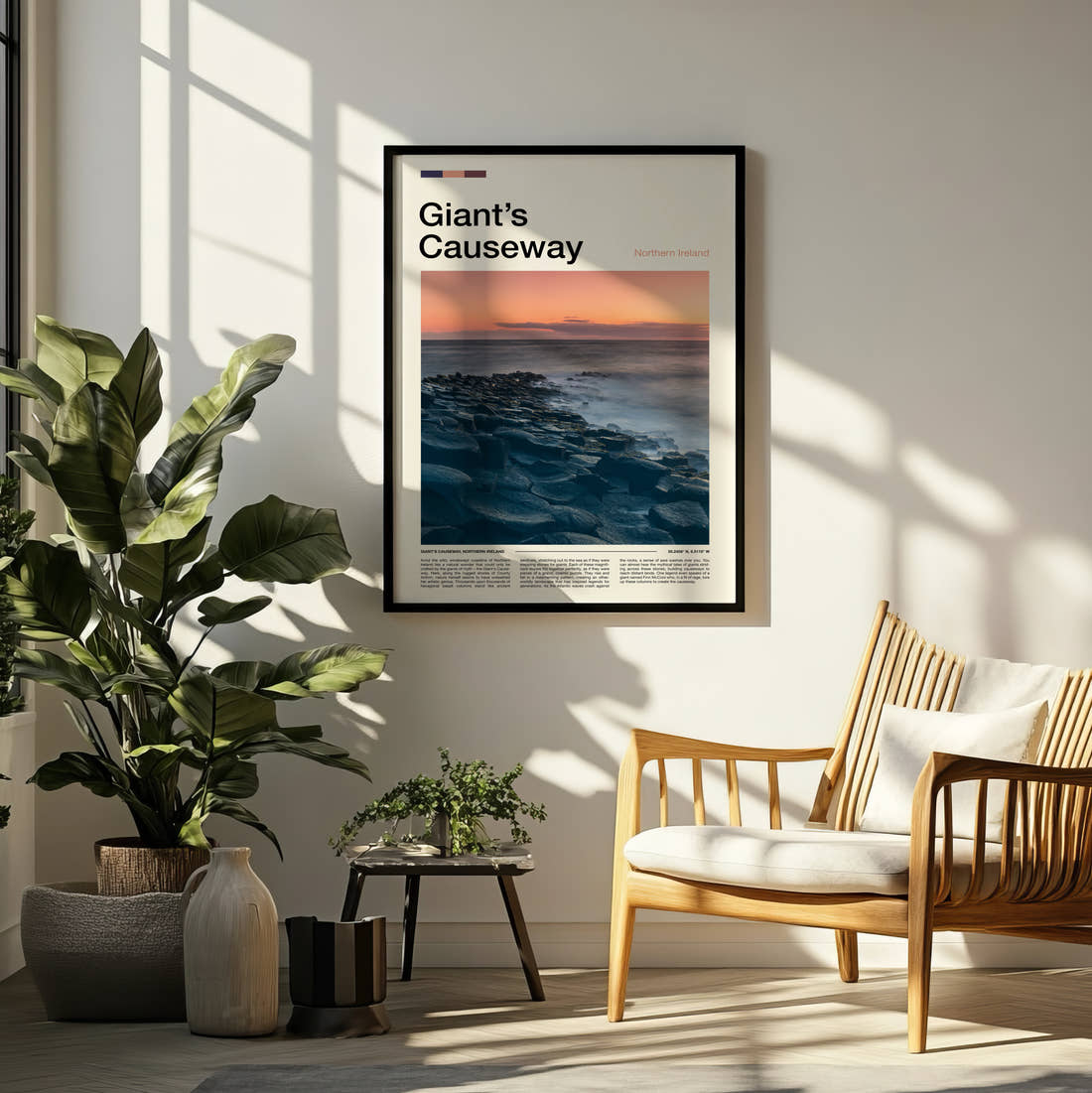 Giant's Causeway Basalt Columns At Sunset Travel Print framed on a pale wall beside houseplants