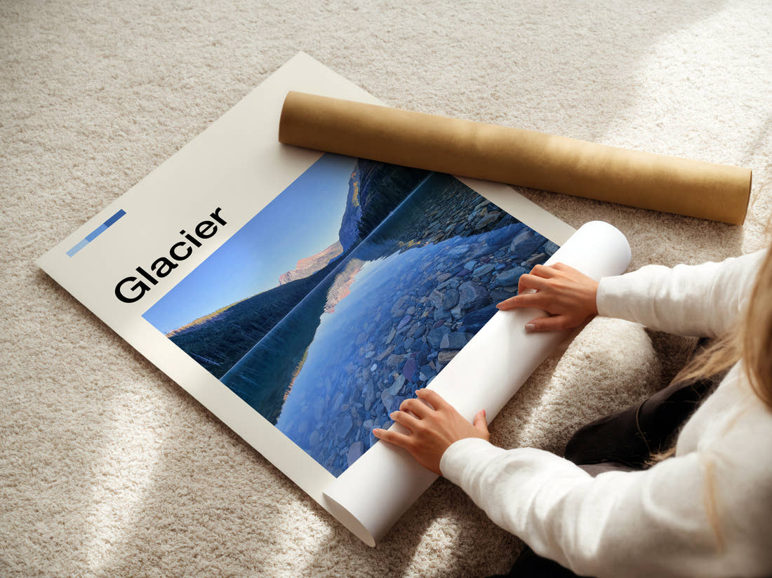 Glacier Clear Lake And Pebbles Travel Print being unrolled from its postal tube