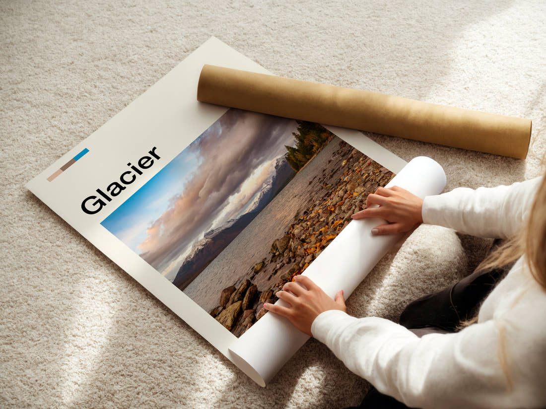 Glacier Pebble Shore By The Lake Travel Print being unrolled from its postal tube