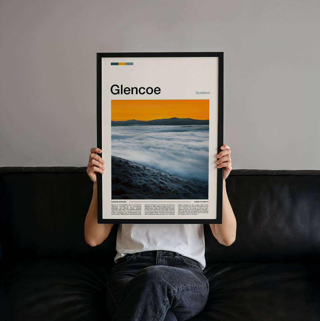 Glencoe Above The Clouds Travel Print held up by hand to show the size of the print