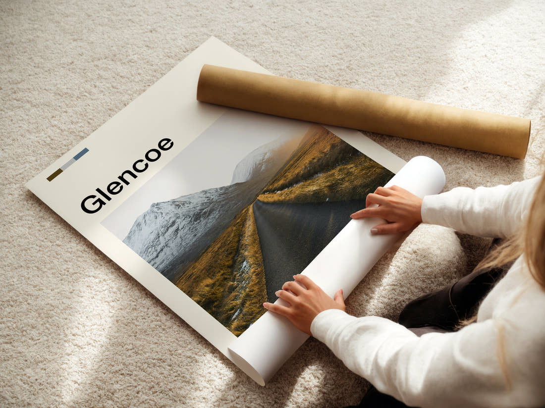 Glencoe Empty Road Through Mountains Travel Print being unrolled from its postal tube