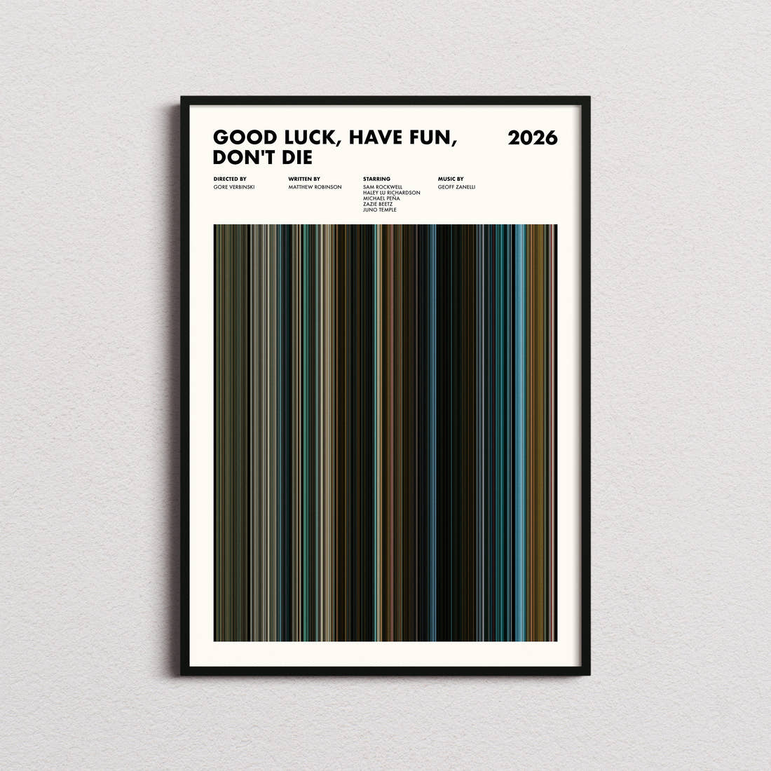 Good Luck, Have Fun, Don't Die Movie Barcode Poster framed on a plain studio wall