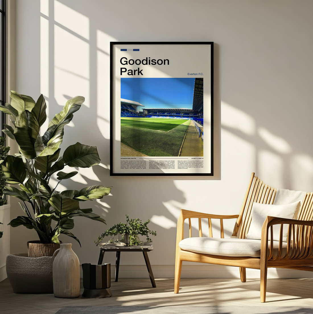 Goodison Park Stadium Print framed on a pale wall beside houseplants