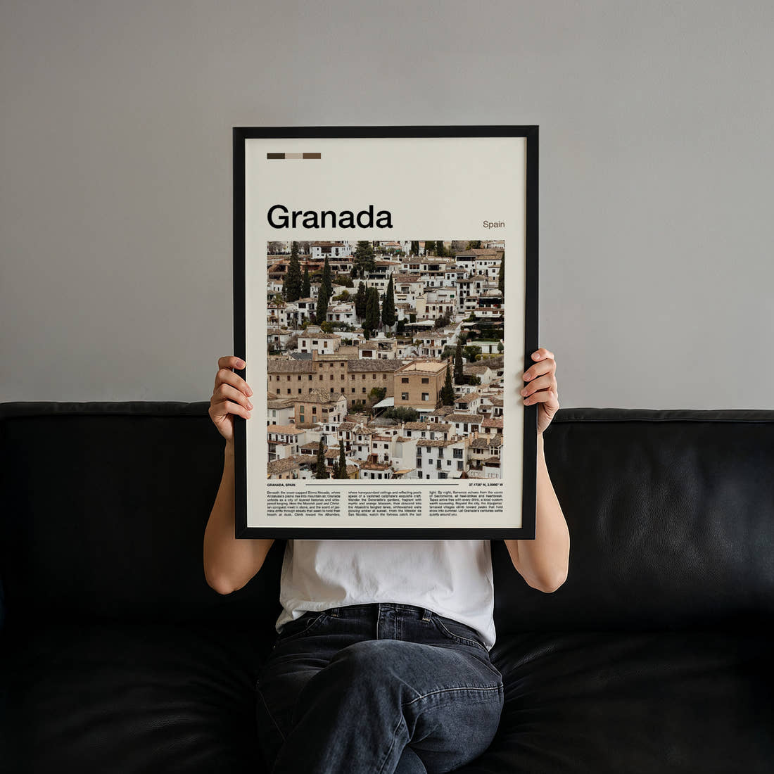 Granada Whitewashed Albaicín Houses Travel Print held up by hand to show the size of the print